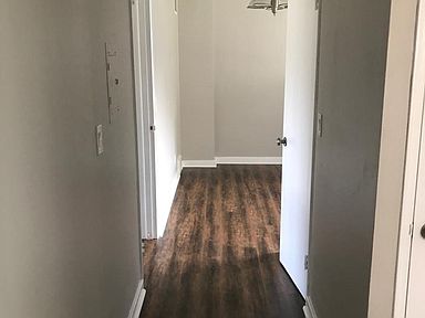 Hallway with wood floor