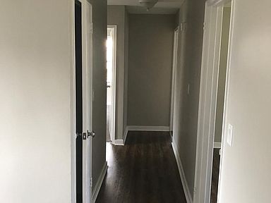 Hallway with wood floor