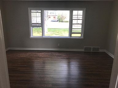 Living room wood floor and window